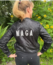 Load image into Gallery viewer, GORGEOUS Black Fully
Sequined Jacket.
Embellished Rhinestone
MAGA! Rib cuffs &amp; collar for comfortable wear.
Versatile Apparel Wear For Dressy Or Casual Wear! A Show Stopper!
Available @
TrumpGirl.com