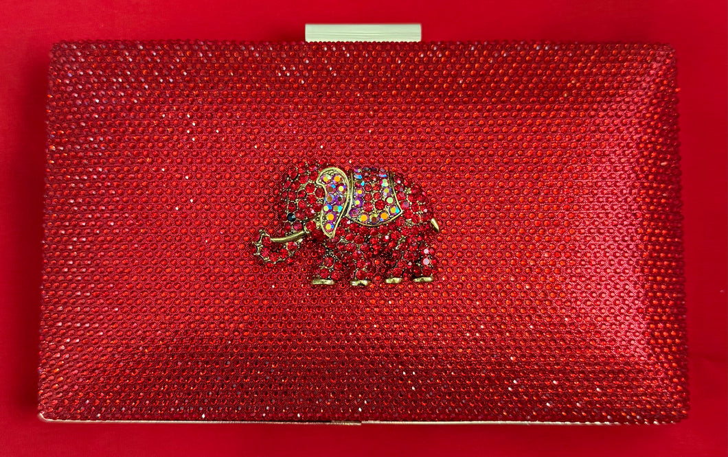 Red Crystal Clutch Handbag. Chain Included For Shoulder Wear. Embellished With A Red Crystal Elephant.