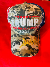 Load image into Gallery viewer, Hats - Signature “Keep America Great 2024”- American Flag Pattern Black ( 3 colours- Available @ TrumpGirl.com