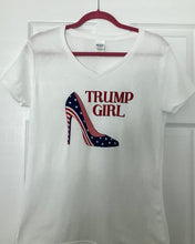 Load image into Gallery viewer, Trump Girl T shirt with patriotic high heel.  The BEST OF THE BEST “Trump Girl “ shirt . Perfect in every way -comfortable &amp; flattering for every figure . A must have staple for every Trump Girls closet ! Short sleeve ladies v-neck . 100% cotton - brand - Gidan.