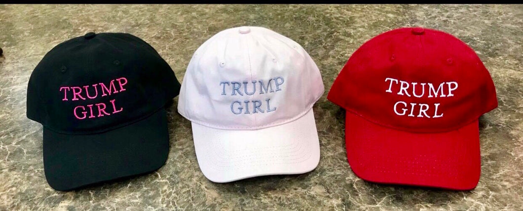 Trump Girl Hat.  For all our Trump women - this is a must have in your collection! With a flattering fit & style, this unique hat runs in 1st place! Black, Pale Pink, or Red Trump Girl Embroidered - Velcro adjustable back-strap for sizing .